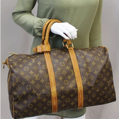 louis vuitton duffle bag sizes|Louis Vuitton duffle bag monogram.